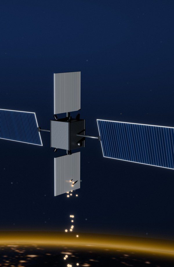 A computing satellite with solar wings above the night side of Earth