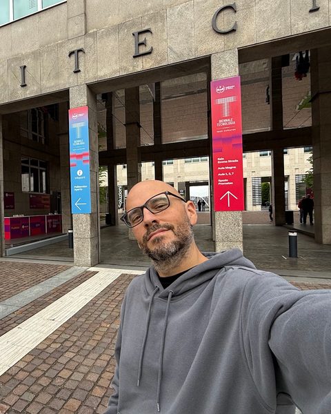 Juan taking a selfie in front of the Politecnico di Torino