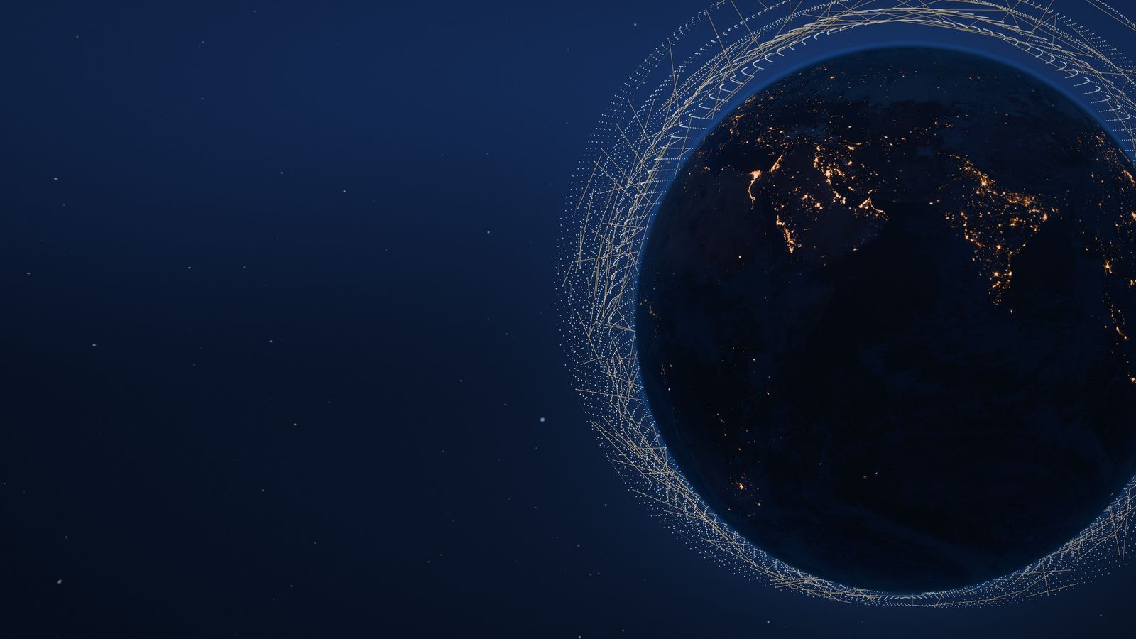 Earth at night ringed by thousands of satellites in dawn-dusk orbits